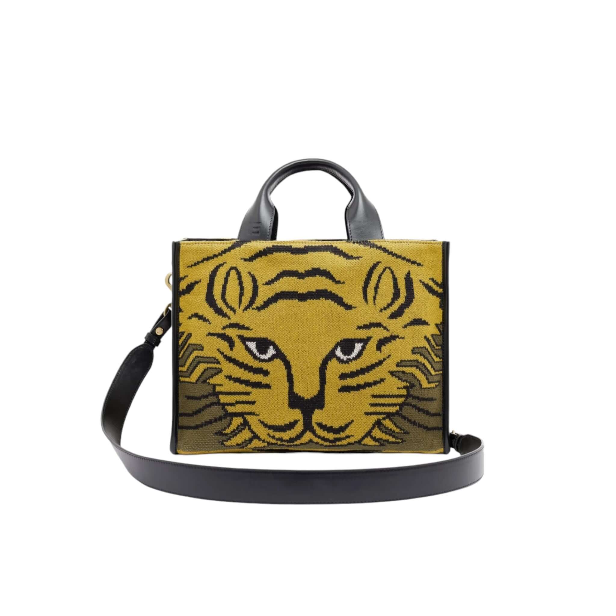 Borsa a tracolla con design tigre su sfondo giallo, manici neri e tracolla removibile.