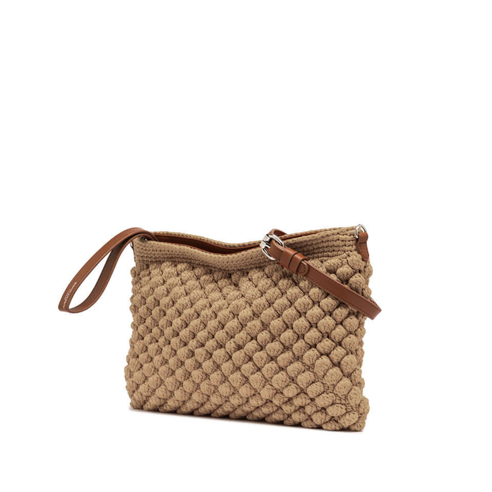 Bella pouch by Gianni Chiarini Firenze in bubble texture with leather details, zip closure and adjustable strap.