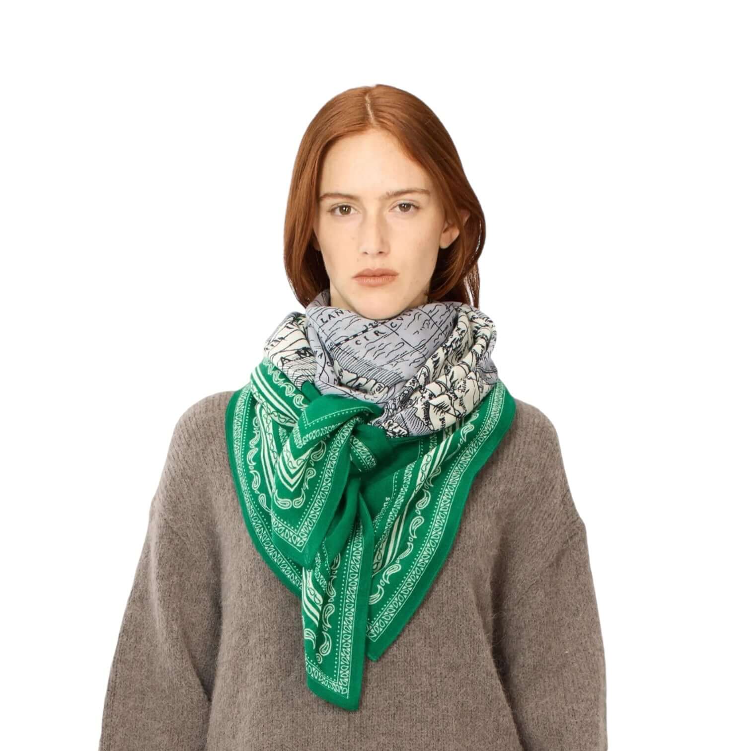 Stylish model wearing the Foulard Quadrato Mappemonde Verde scarf, perfect accessory for any outfit.