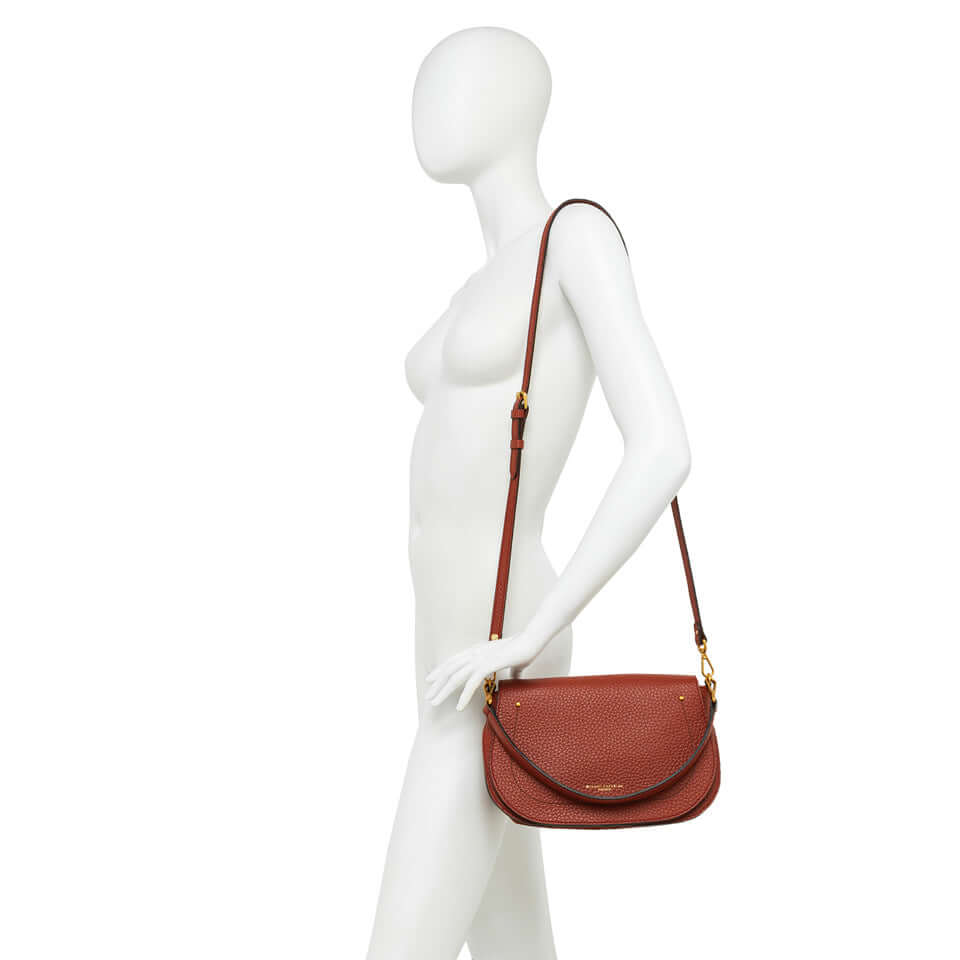 OLGA by Gianni Chiarini, a stylish daily bag in maxi grain leather, showcased on a mannequin.