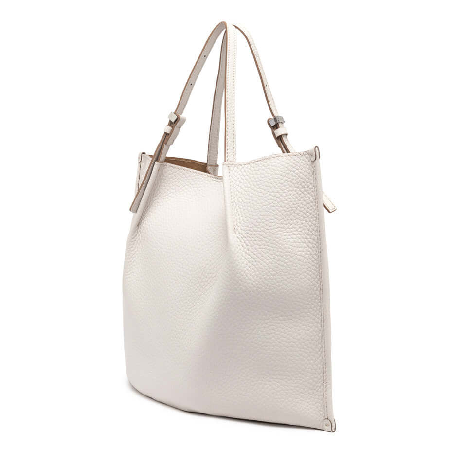 Dory handbag in white leather with simple design and adjustable twin logo straps.