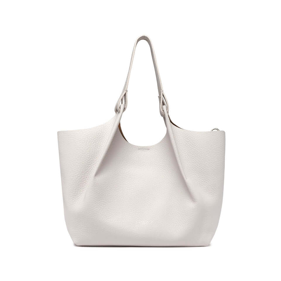 DUA white leather tote bag with contemporary design and double-grain texture, perfect for enhancing any outfit.