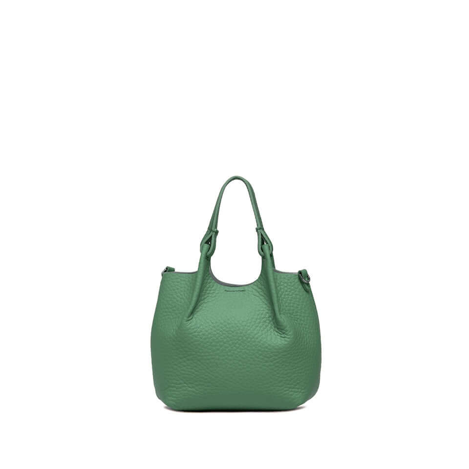 Green DUA handbag made of double-grain leather, featuring two handles and a magnetic closure.
