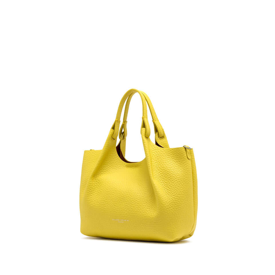 Yellow leather handbag with double handles and a simple design, perfect for elevating your look.