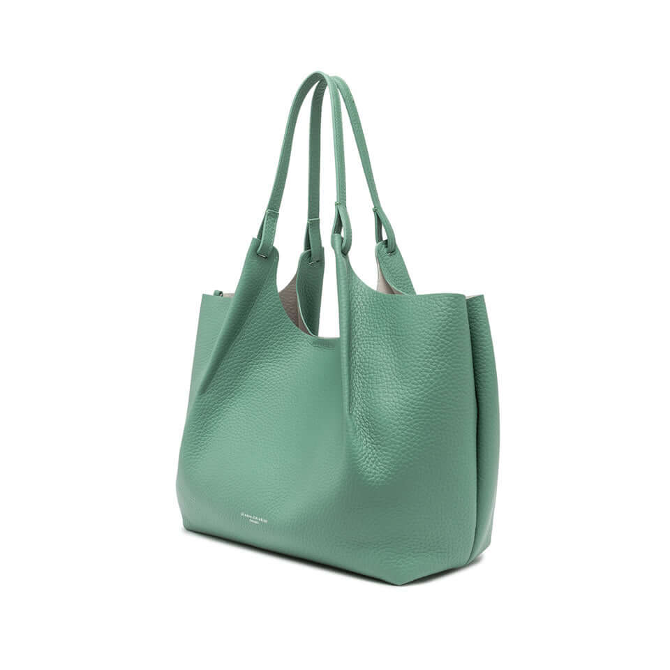 DUA green leather bag with simple contemporary design and two shoulder straps.