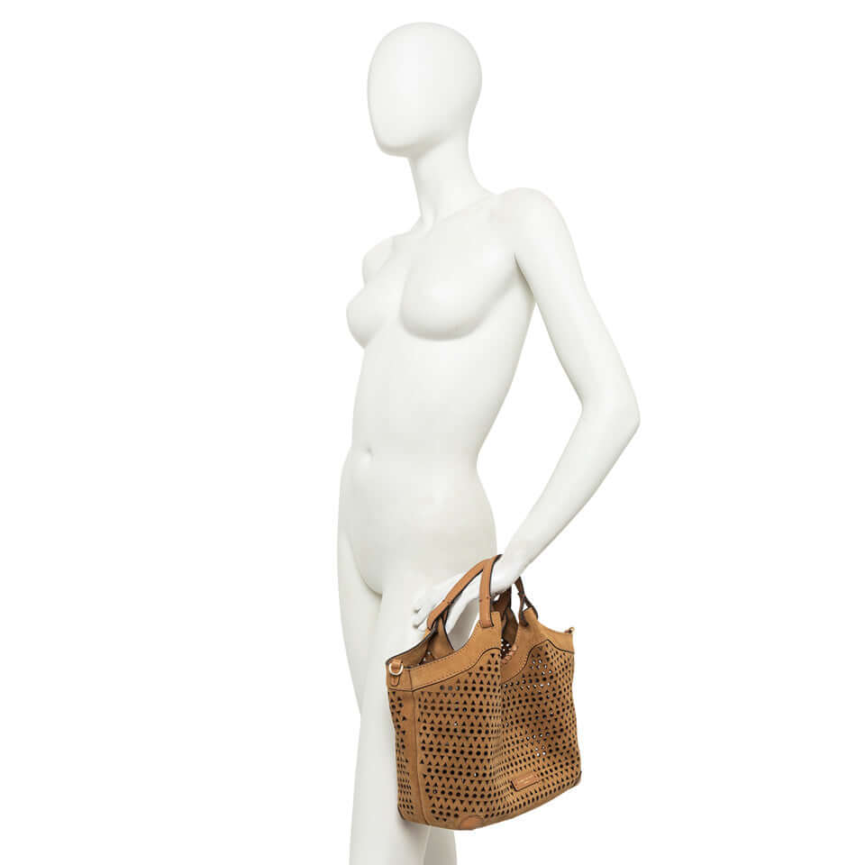 DUA handbag in suede with perforated design, showcased on a mannequin for a contemporary look.