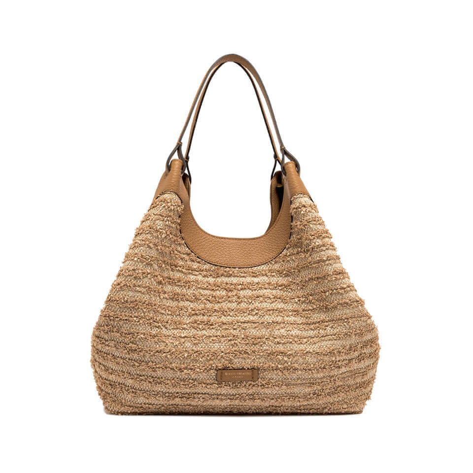 Stylish DUA straw handbag with leather accents and double handles, perfect for any outfit.