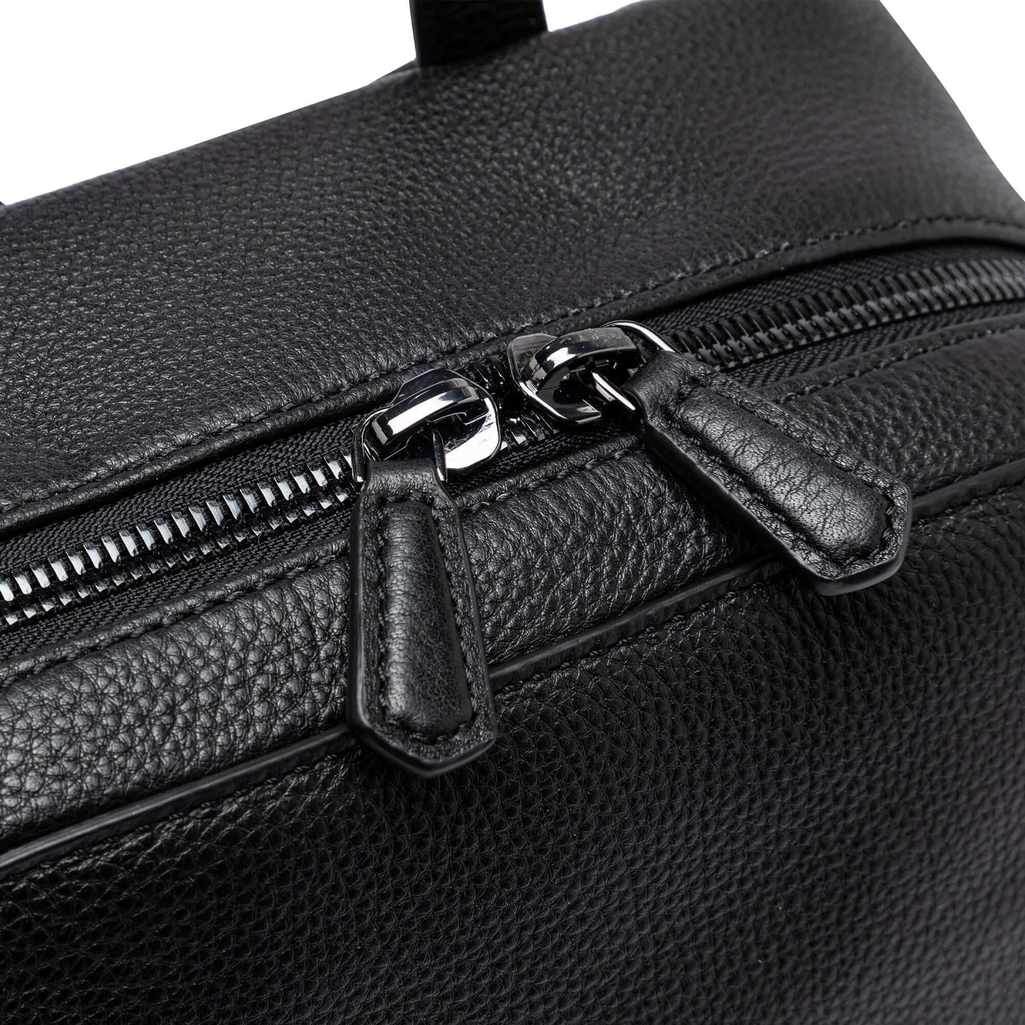 Close-up of the zipper detail on Gianni Chiarini Firenze Florence backpack in textured black leather.