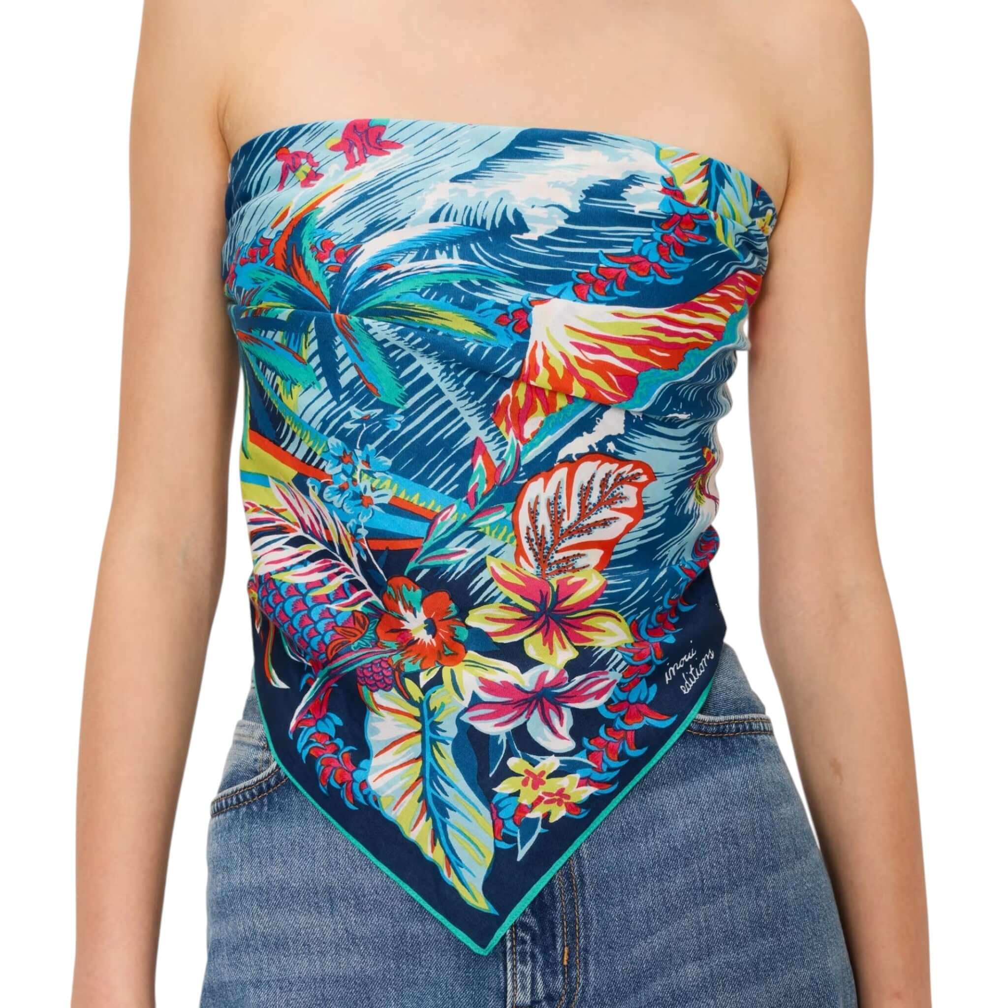 Colorful Hawaiian square scarf worn as a top, showcasing vibrant floral and tropical designs.
