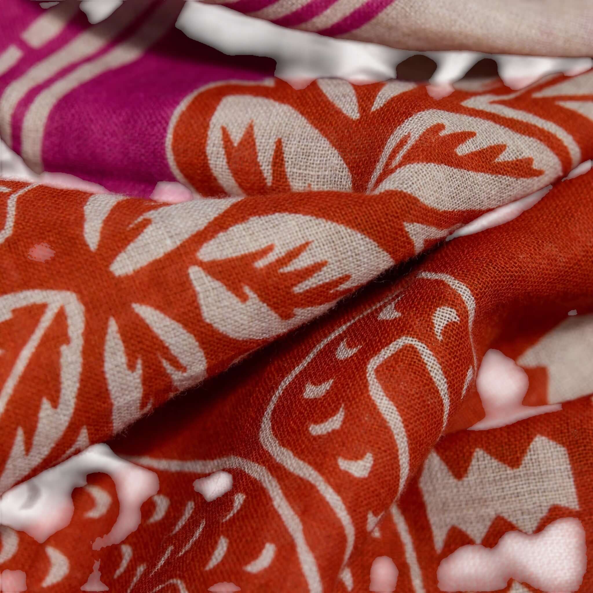 Foulard Quadrato Jungle in vibrant orange and pink fabric, featuring detailed jungle-inspired patterns.