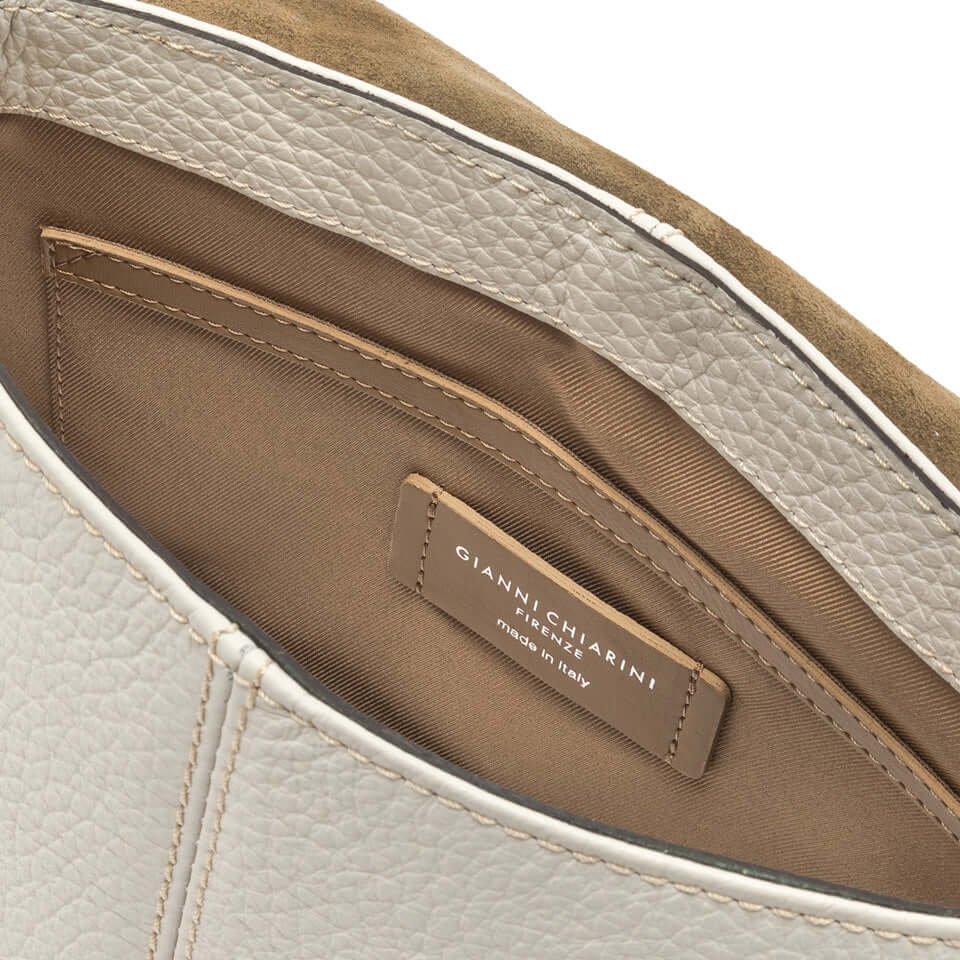 Interior view of Alessandra bag by Gianni Chiarini Firenze, featuring leather detailing and brand label.