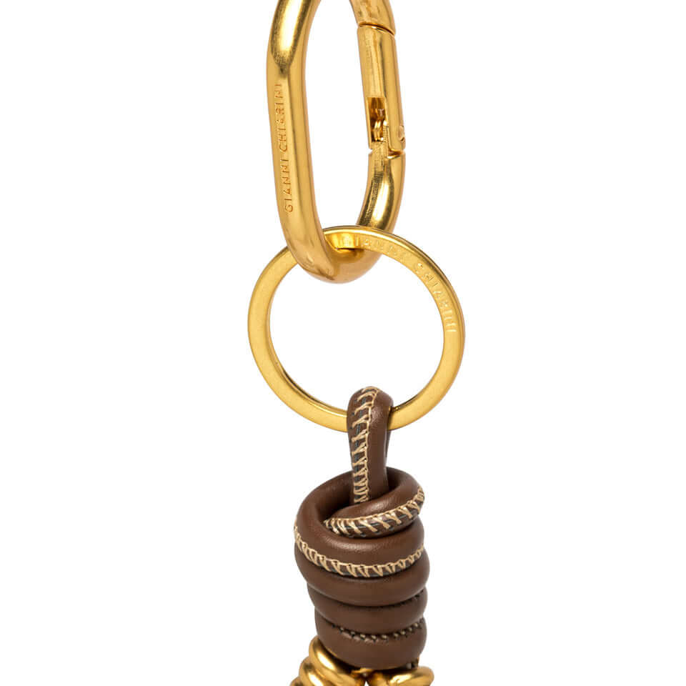CHARM Desert Flower by Gianni Chiarini, leather design with gold accents for bags and backpacks, elegant and stylish.