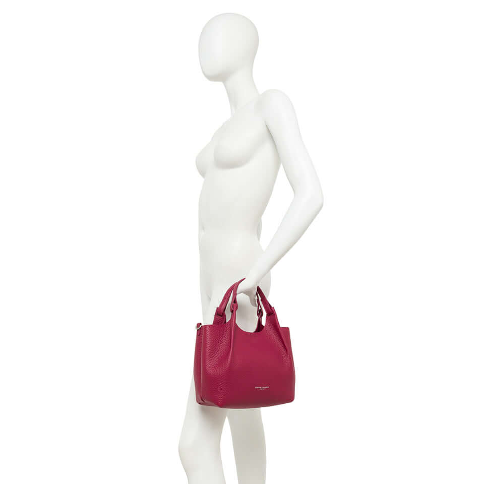 DUA handbag by Gianni Chiarini in textured maxi grain leather, with dual handles and a practical zip pouch.