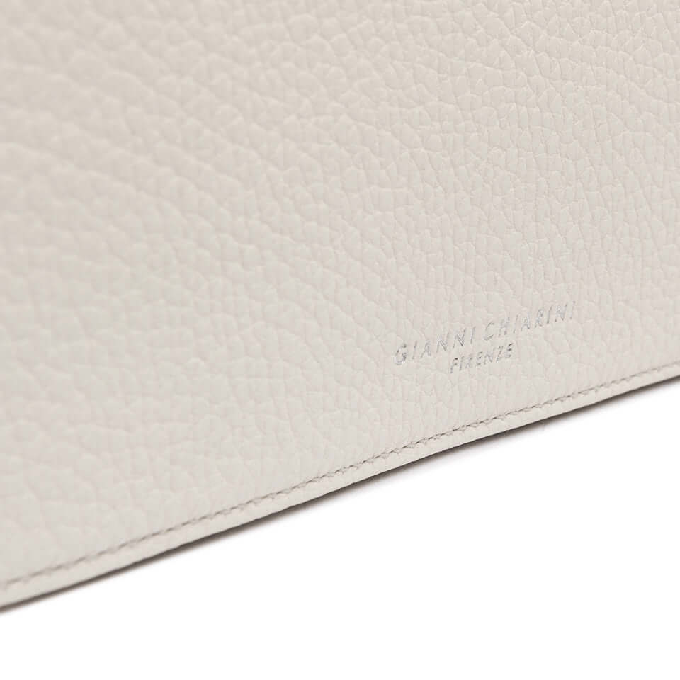 Close-up of Gianni Chiarini Firenze wallet in textured leather, showcasing the logo and elegant design.