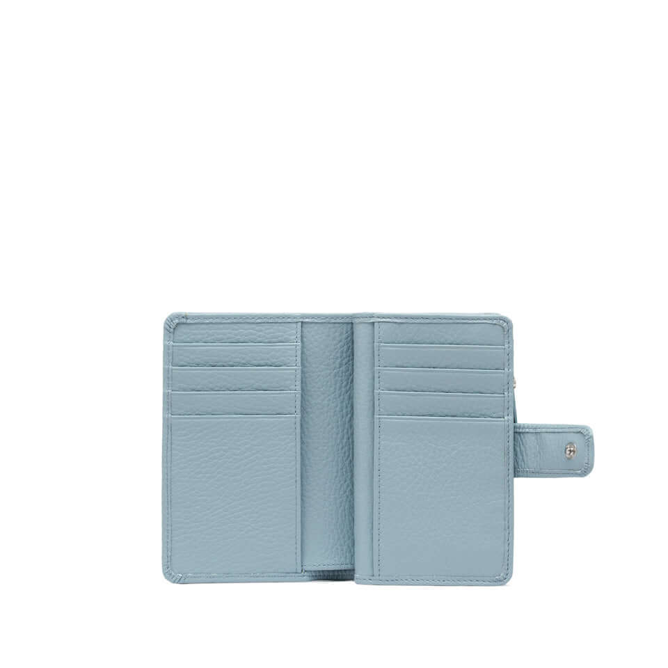 Open light blue wallet by Gianni Chiarini, featuring multiple card slots and a secure snap closure.