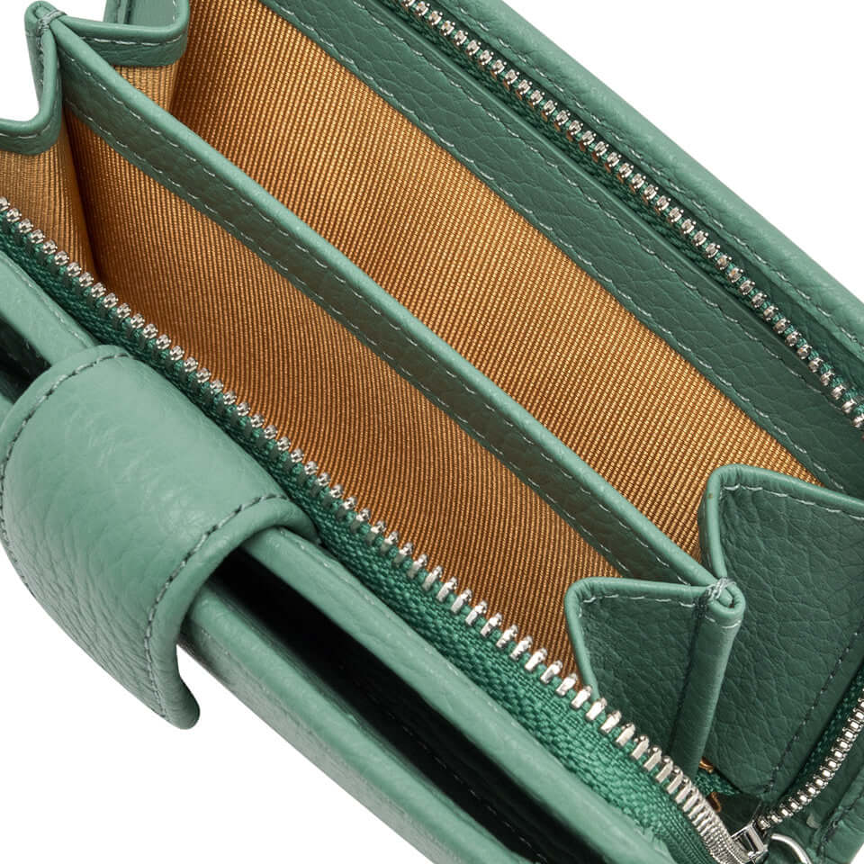 Interior view of Gianni Chiarini Firenze wallet in soft textured leather, showcasing multiple compartments and a zipper.