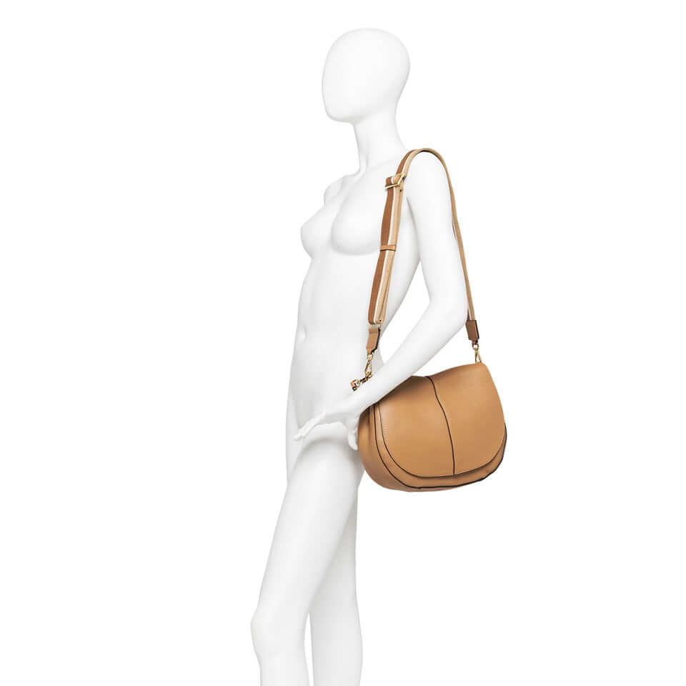 Gianni Chiarini Helena Round bag in tan leather, displayed on a mannequin, showcasing its chic and structured design.