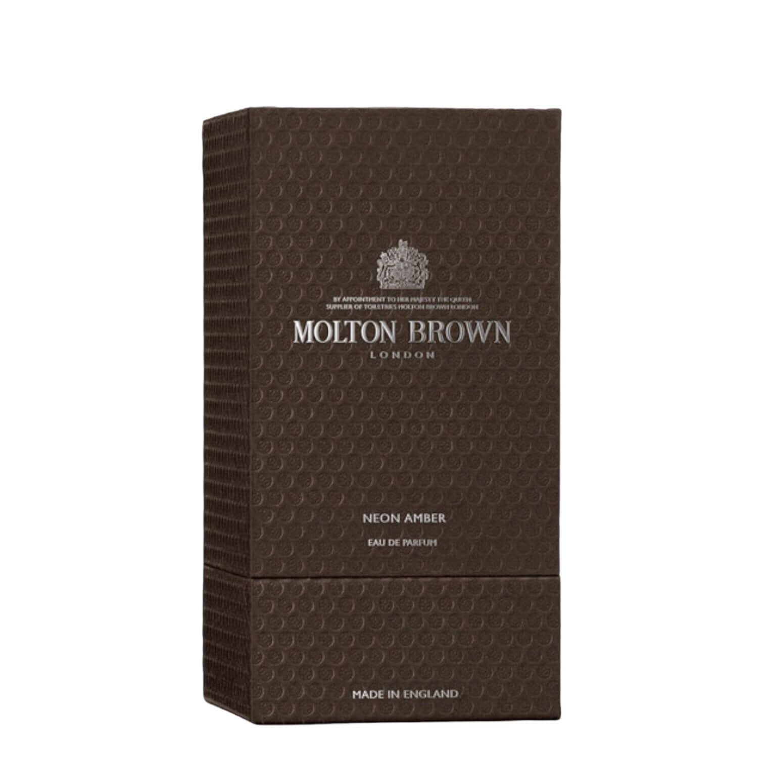 Molton Brown Neon Amber Eau De Parfum packaging, featuring a textured brown box design.
