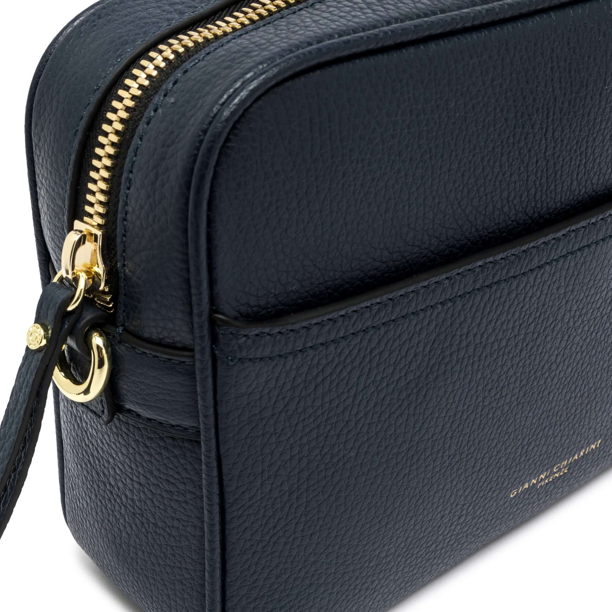 Nina by Gianni Chiarini Firenze, dark green textured leather crossbody bag with gold zipper detail.