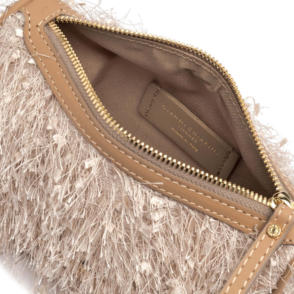 Inside view of the Nora Pouch by Gianni Chiarini Firenze, featuring frayed fabric and leather zip closure.