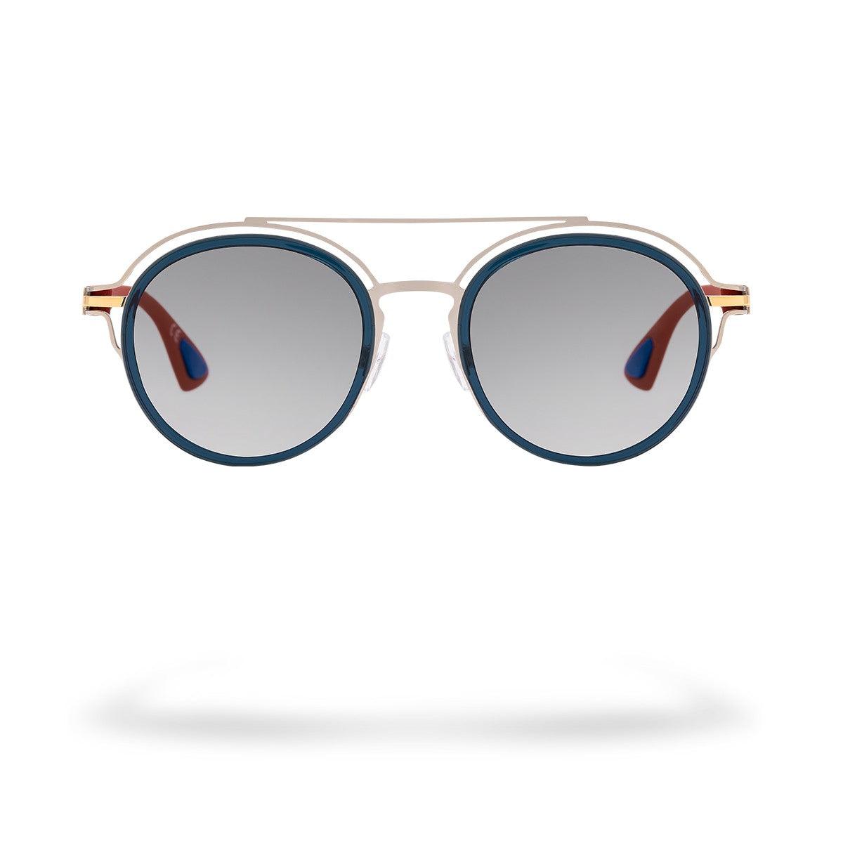 SANTORINI C3 sunglasses with round lenses and blue frames, featuring red soft touch arms for a modern look.