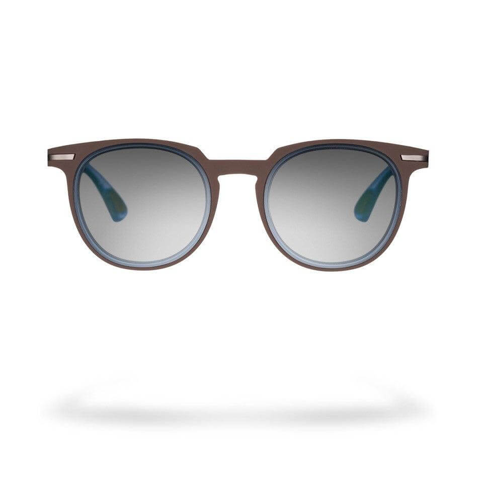 Occhiali da sole LINO C6 con montatura leggera e lenti sfumate, design moderno e colori a contrasto.