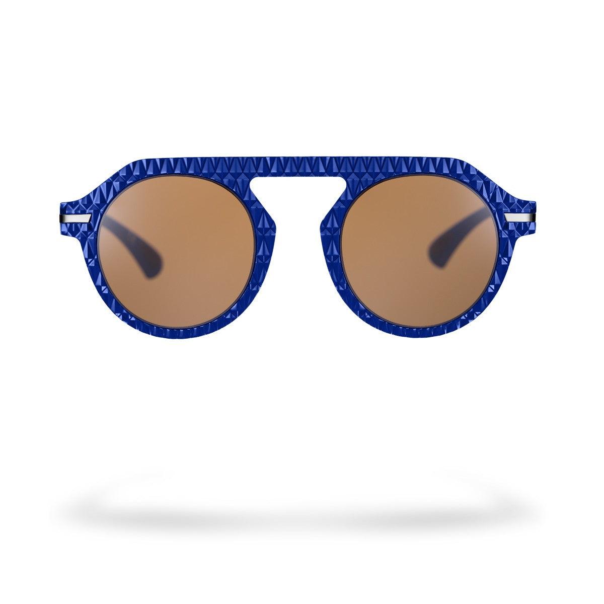 Occhiali da sole MARCO C3 con frontale geometrico blu e lenti marroni per comfort visivo.