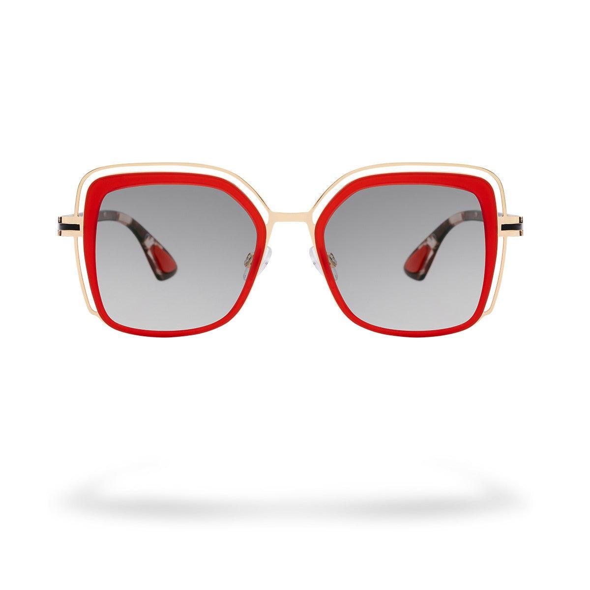 Occhiali da sole PHUKET C5 con montatura dorata e frontale rosso, stile unico e femminile.