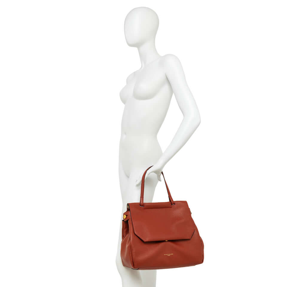 OTTAVIA by Gianni Chiarini, stylish red leather bag with top handle and adjustable crossbody strap.