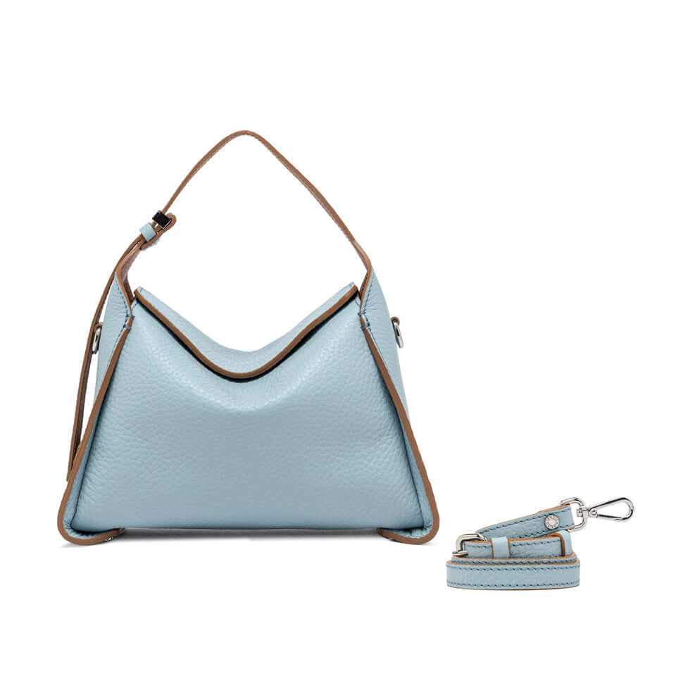 Light blue Penelope handbag with a boxy structure and detachable strap.