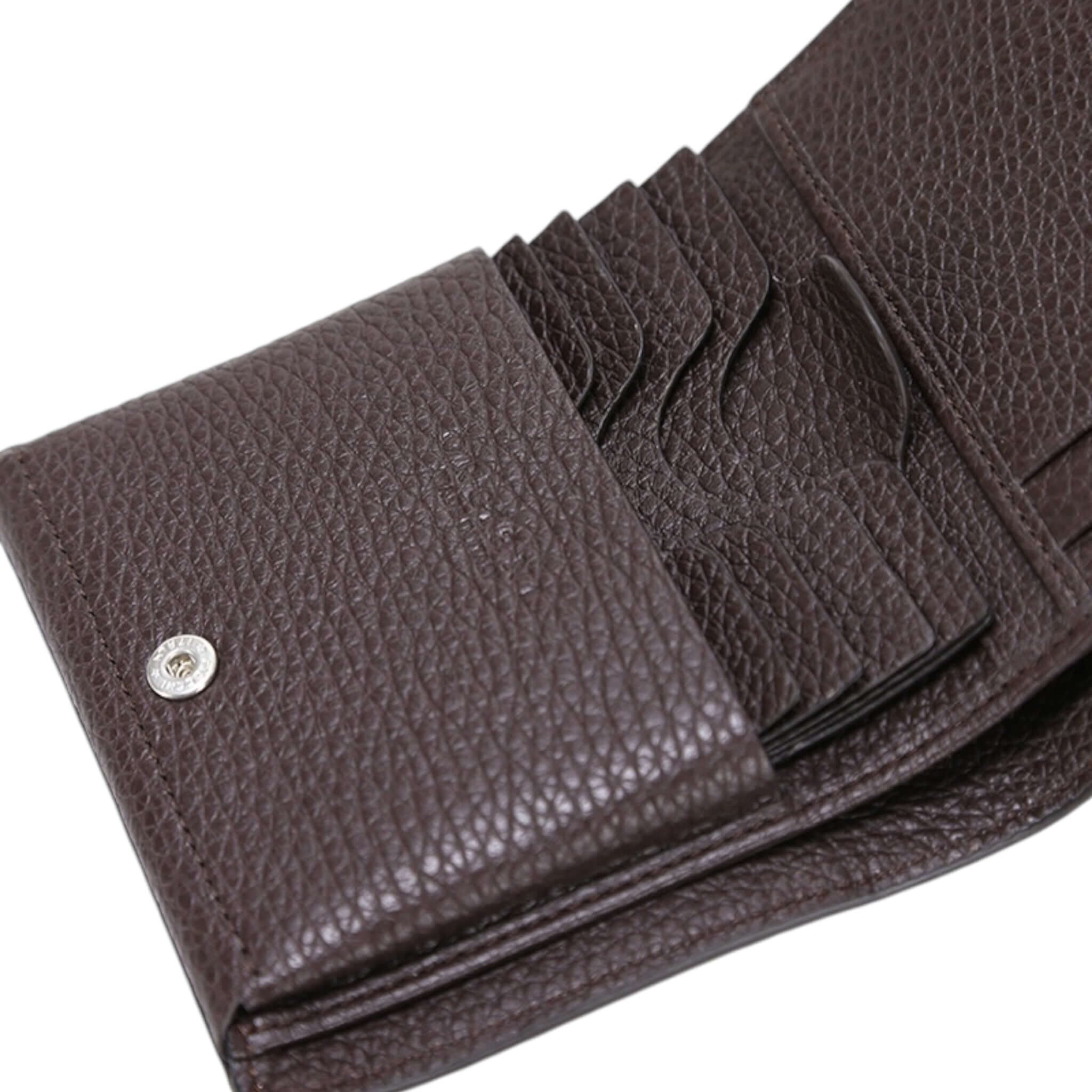 Portafoglio Micron verticale in pelle martellata con soffietto e scomparti per carte, color marrone.
