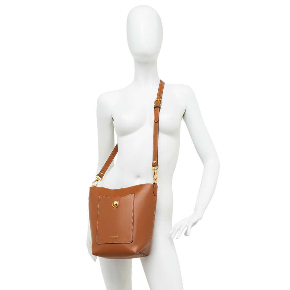RUBINA by Gianni Chiarini Firenze, a stylish brown bucket bag with shoulder strap and front pocket detail.