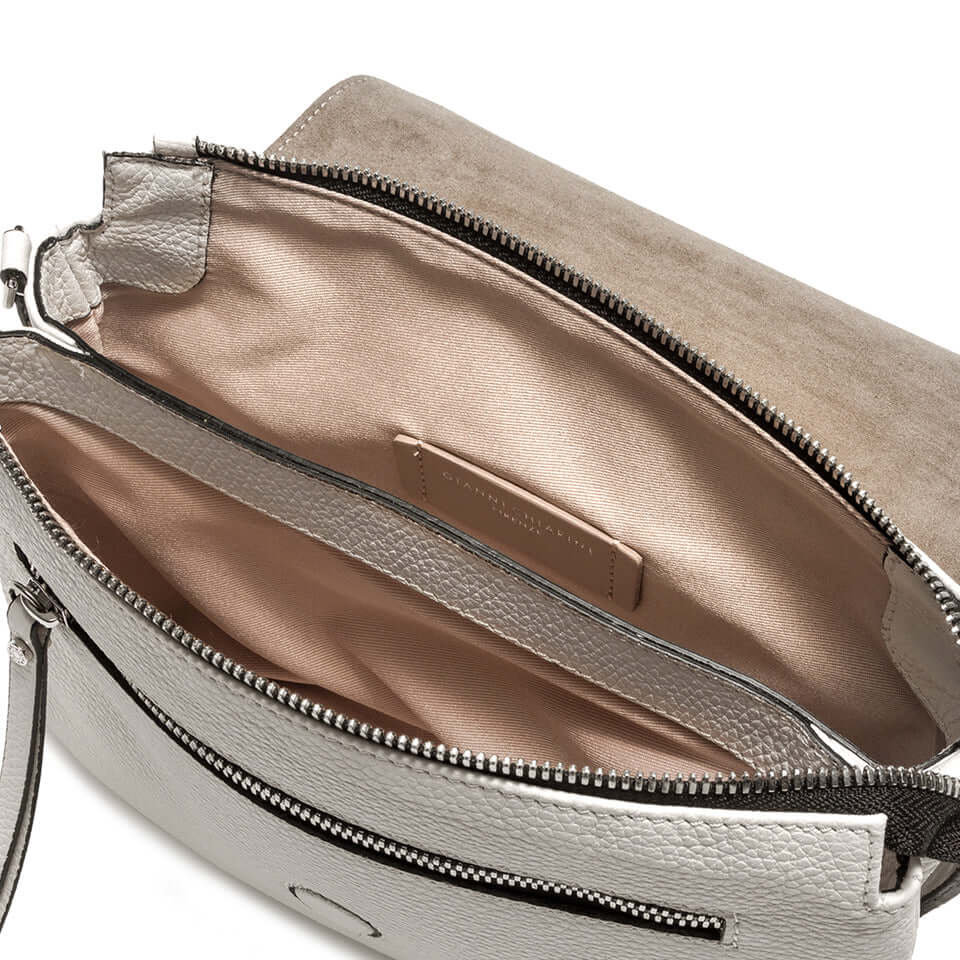 Interior view of the Three Gianni Chiarini Firenze handbag showcasing two compartments and soft lining.