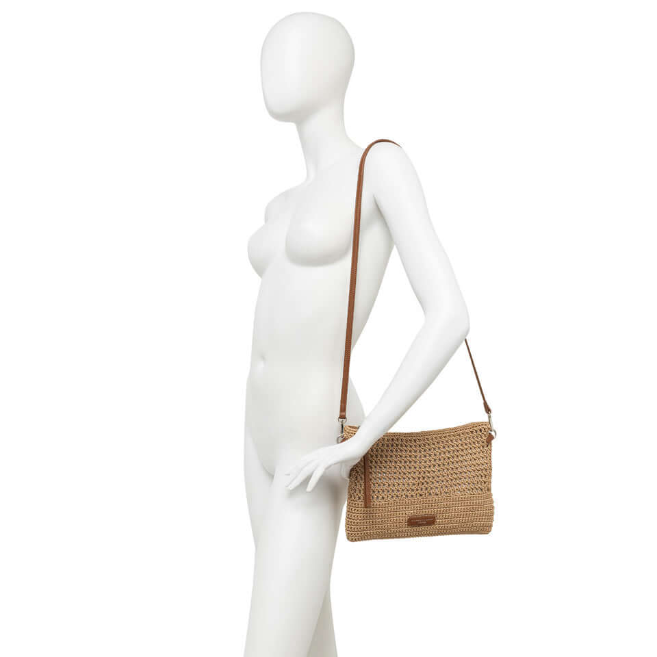 Victoria by Gianni Chiarini Firenze, a stylish summer crossbody bag in crocheted fabric with leather details.