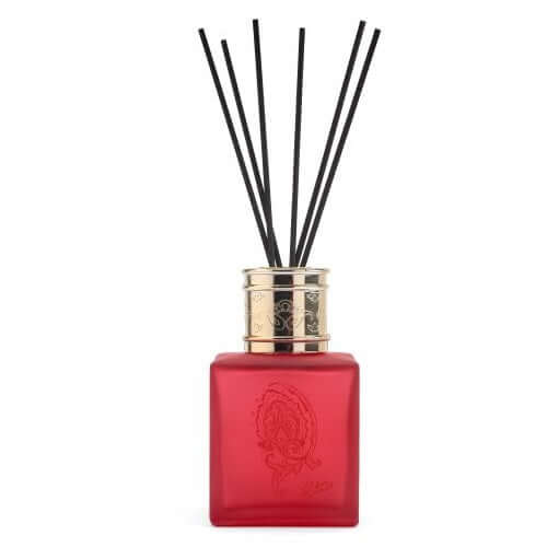 Demetra Diffusore with elegant bordeaux glass bottle and black reeds, luxurious home fragrance decor.