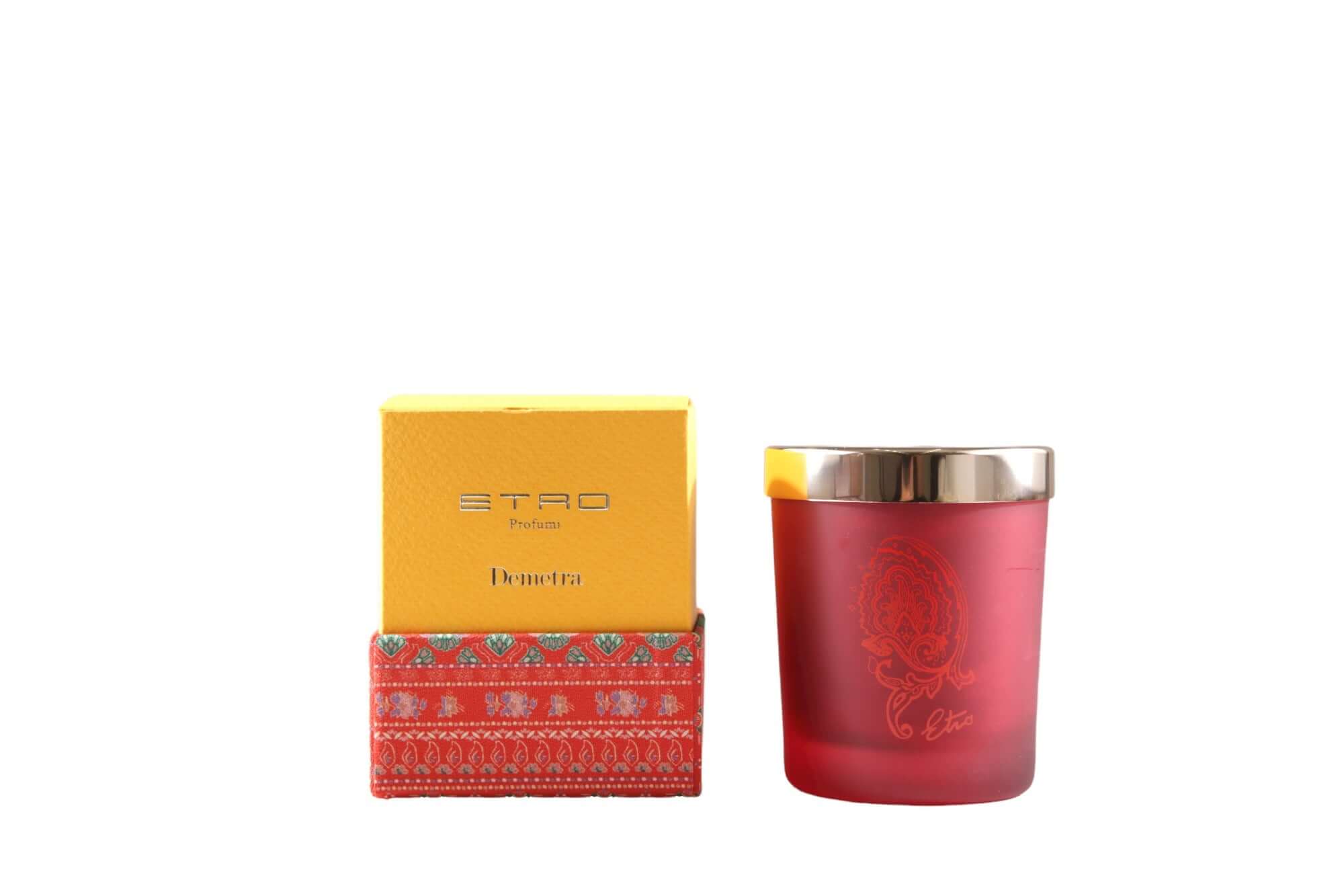 Demetra Candela in bordeaux glass with gold lid, ETRO branding, and decorative packaging.