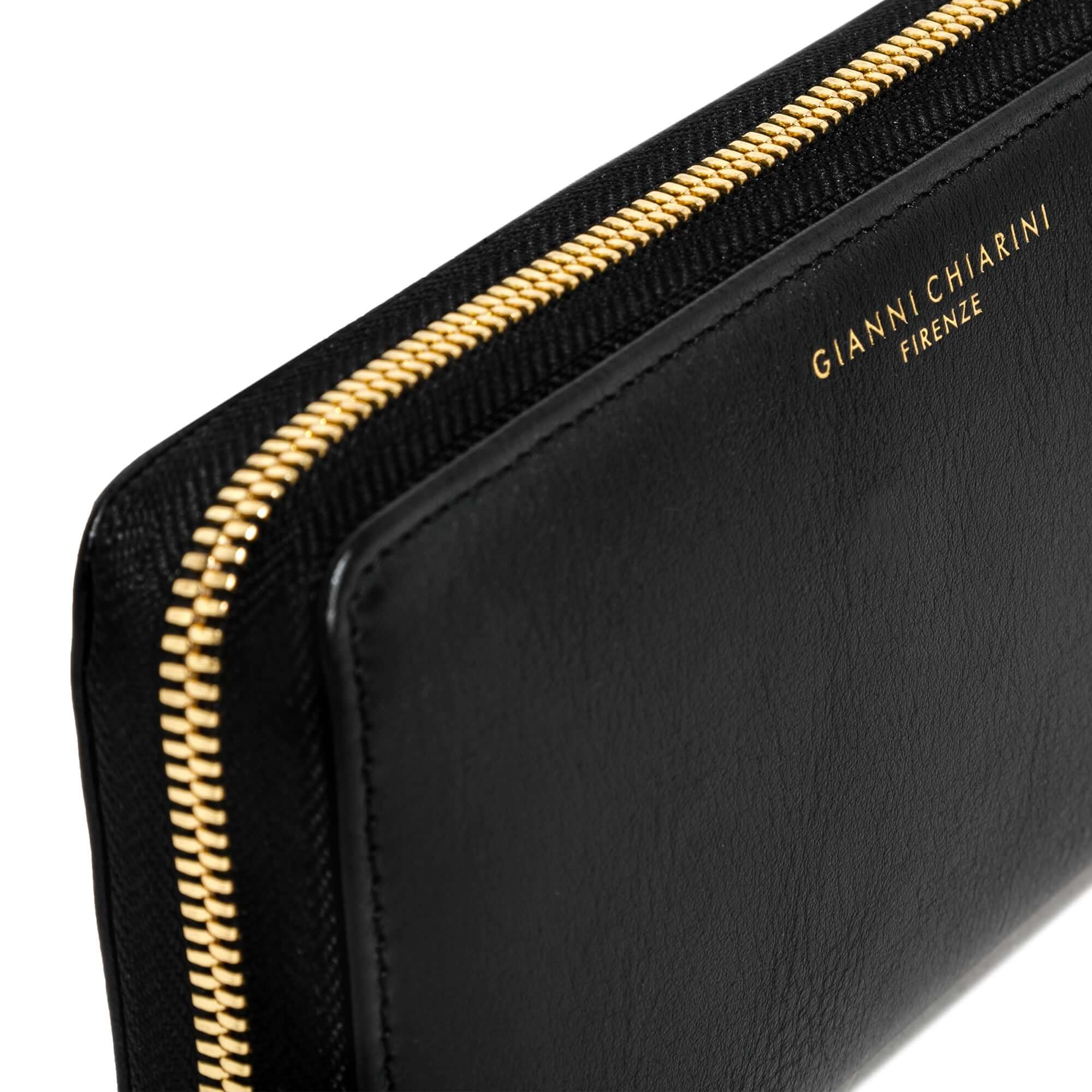 Gianni Chiarini Madrid Wallet in smooth black leather with gold zipper detail, stylish and functional design.