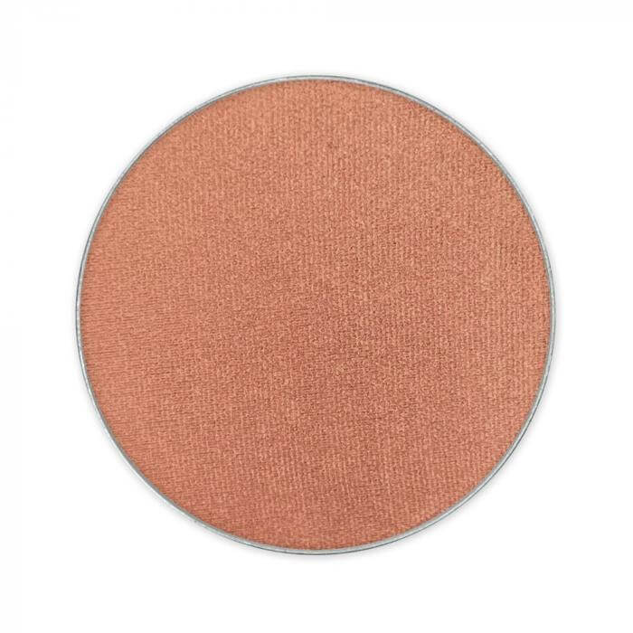 Copper eyeshadow powder in a round pan, perfect for adding a shimmering touch to your makeup look.