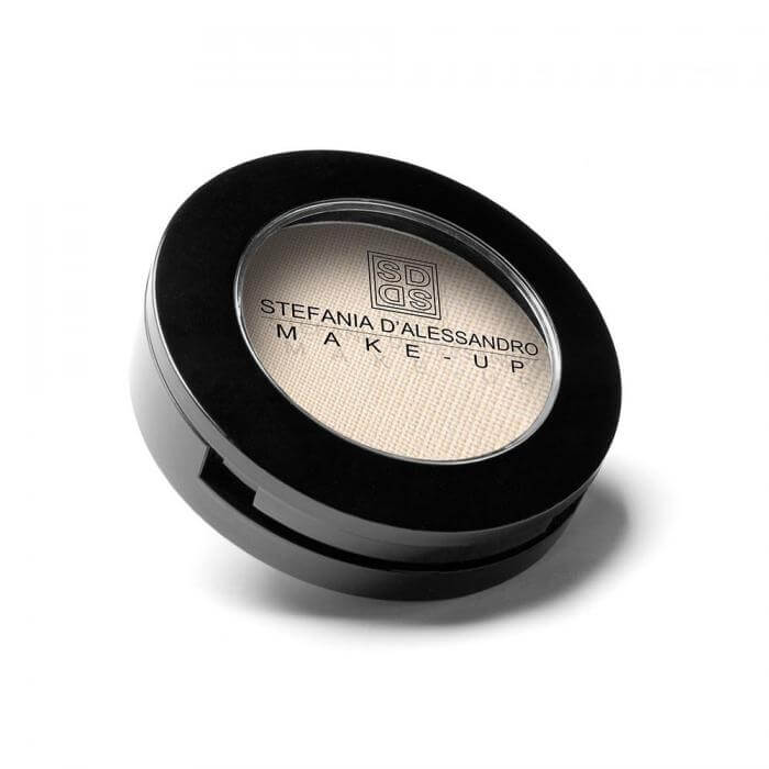 Frosty Ivory eyeshadow by Stefania D'Alessandro in a sleek black compact, perfect for adding shimmer to your makeup look.