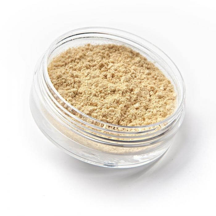 Ombretto Golden White in a clear jar, fine golden white powder with iridescent shimmer for vibrant makeup looks.