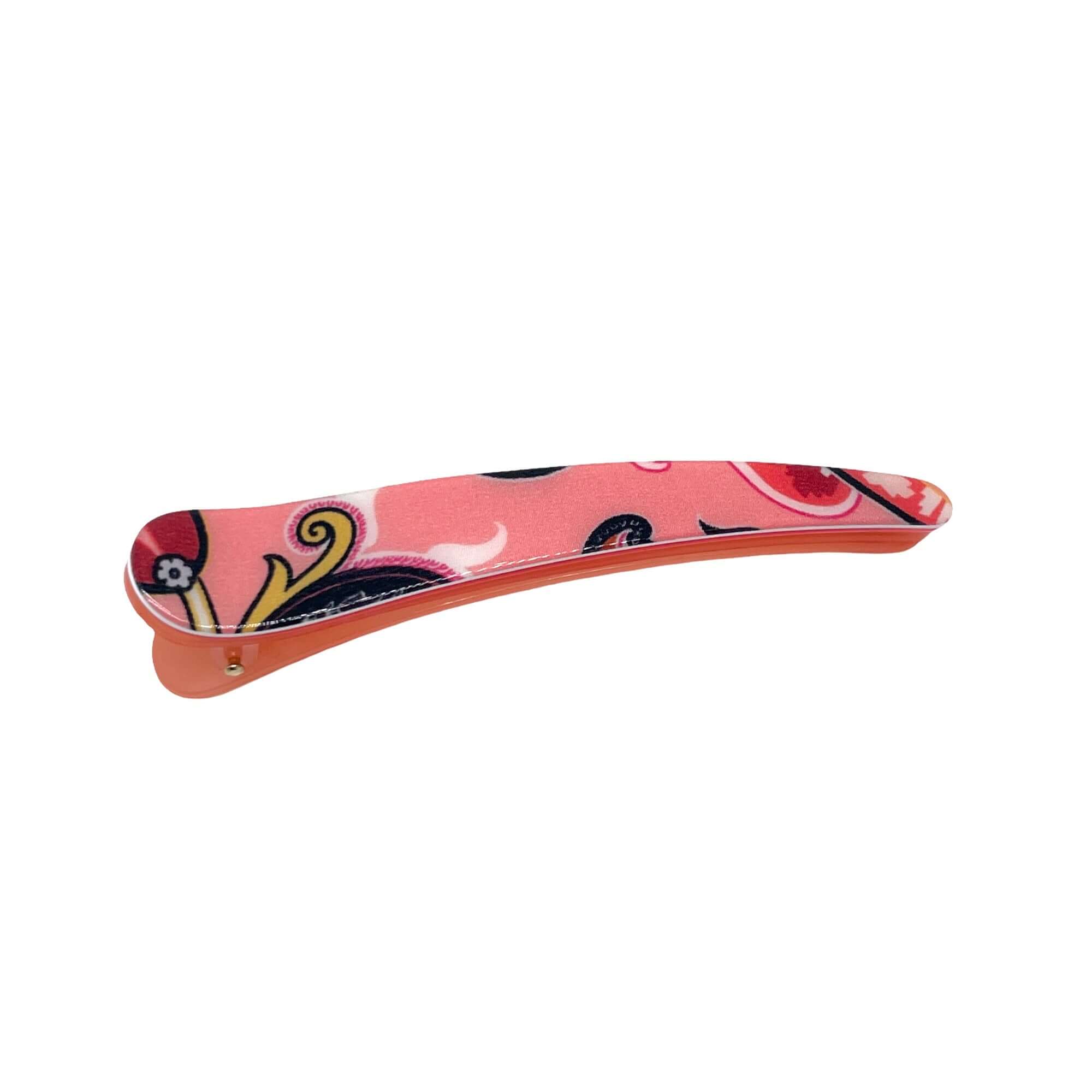 Becco per capelli in rosa fantasia, realizzato in acetato e seta, elegante e funzionale per acconciature.