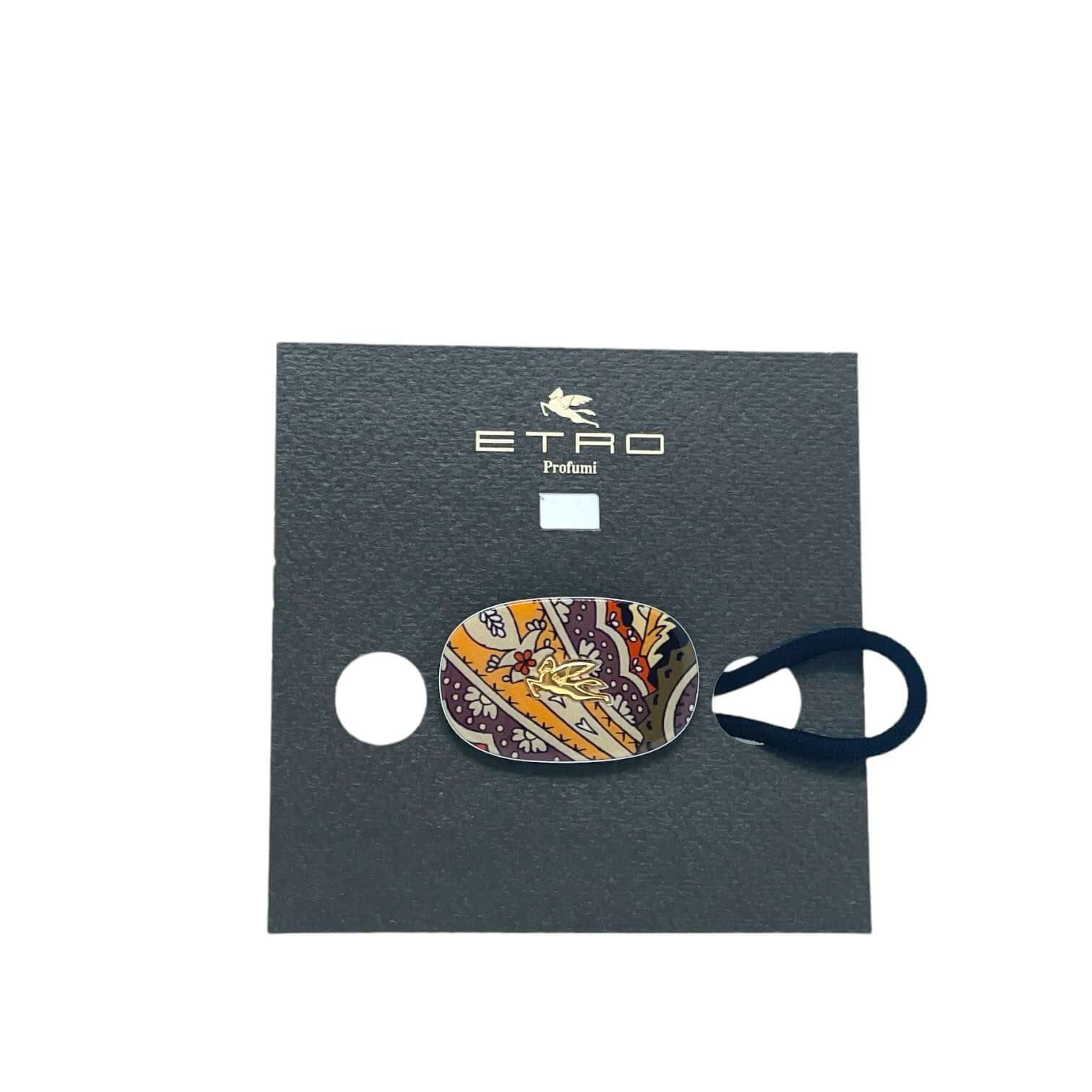 Elastico con pegaso piccolo, un accessorio elegante in acetato, nylon e gomma con design colorato su fondo scuro.