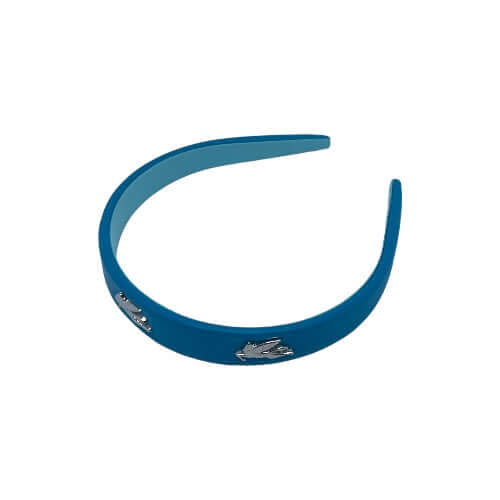 Cerchietto dorato con tre pegasi turchesi, realizzato in poliuretano, poliestere e cotone, elegante accessorio capelli.