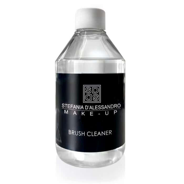 Bottle of Brush Cleaner by Stefania D'Alessandro for effective makeup brush cleaning and hygiene.