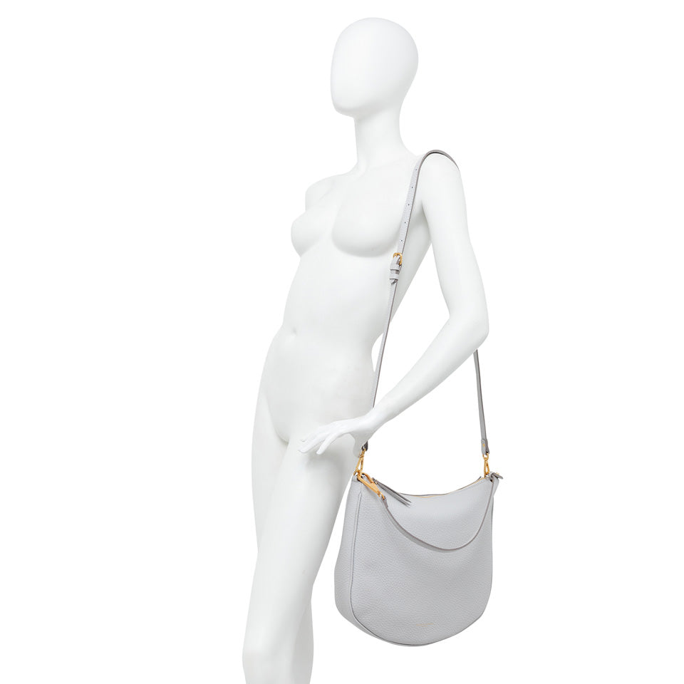 Large gray shoulder bag, Brooke, in bubble leather with removable strap, displayed on a mannequin.