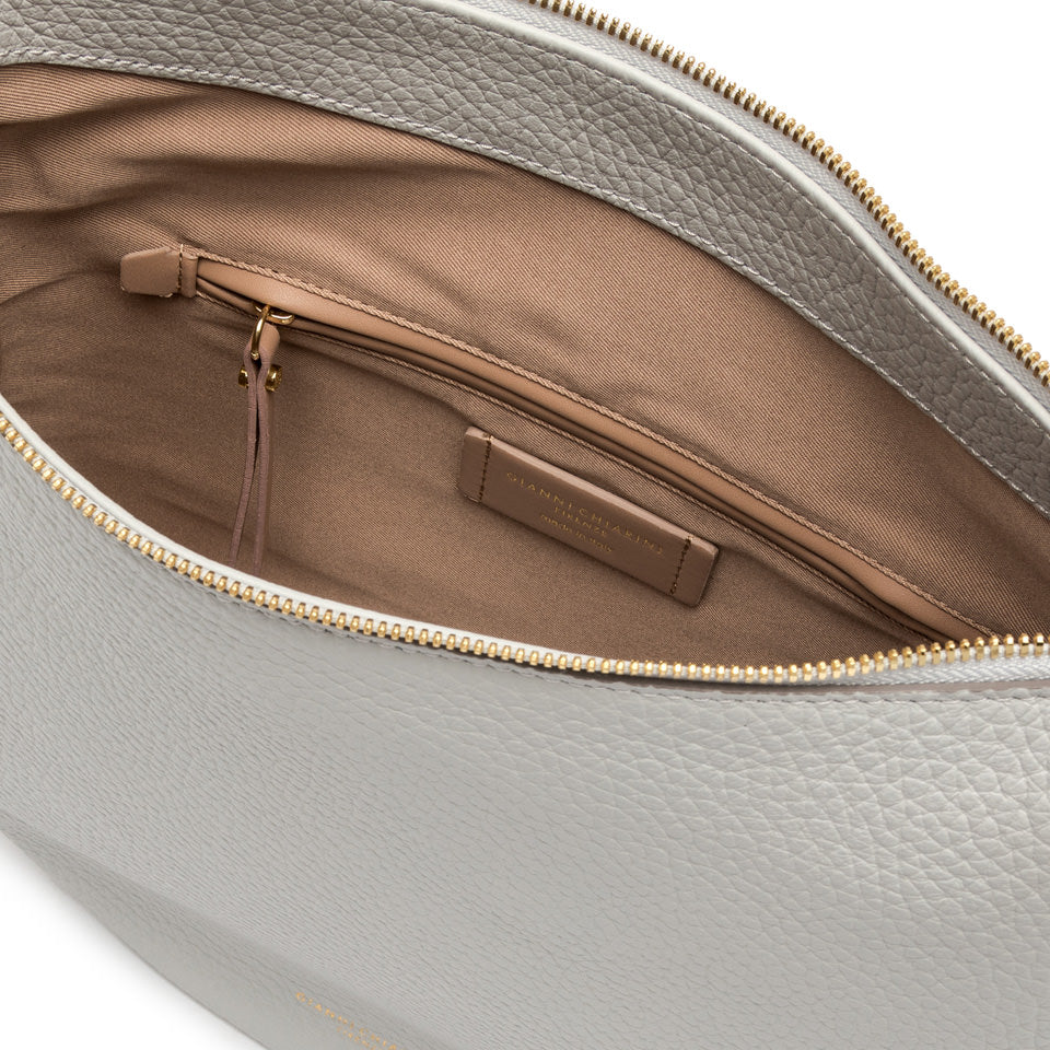 Interior view of large leather shoulder bag Brooke, showing zip pocket and spacious storage.