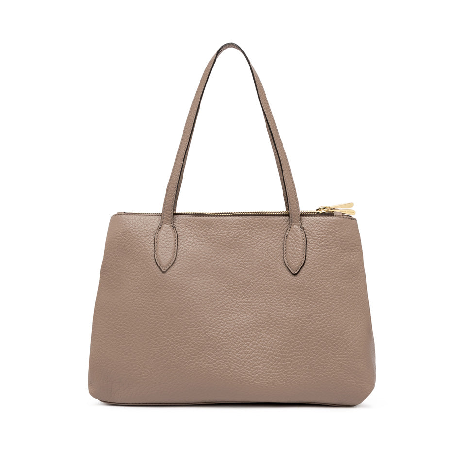 Elegant Mara shopping bag in taupe leather with double zip and long handles, perfect for office or weekend use.