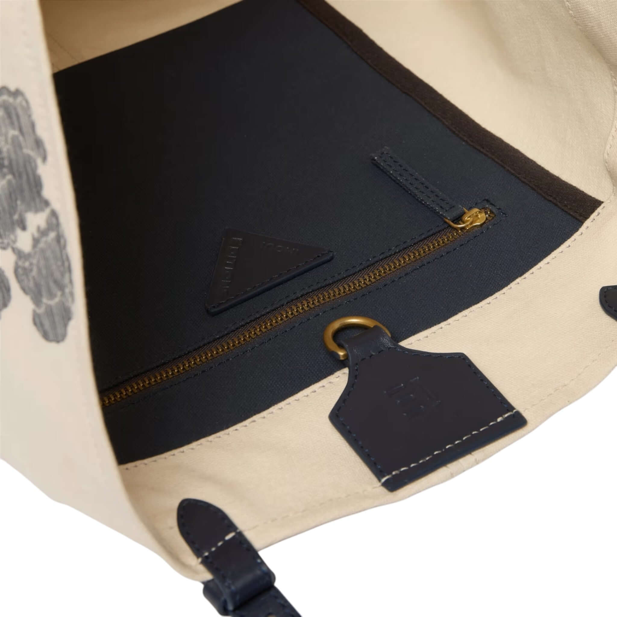 Interno della Borsa Shopping Des Rives Et Des Reves con tasca e zip in cotone e pelle, design elegante.