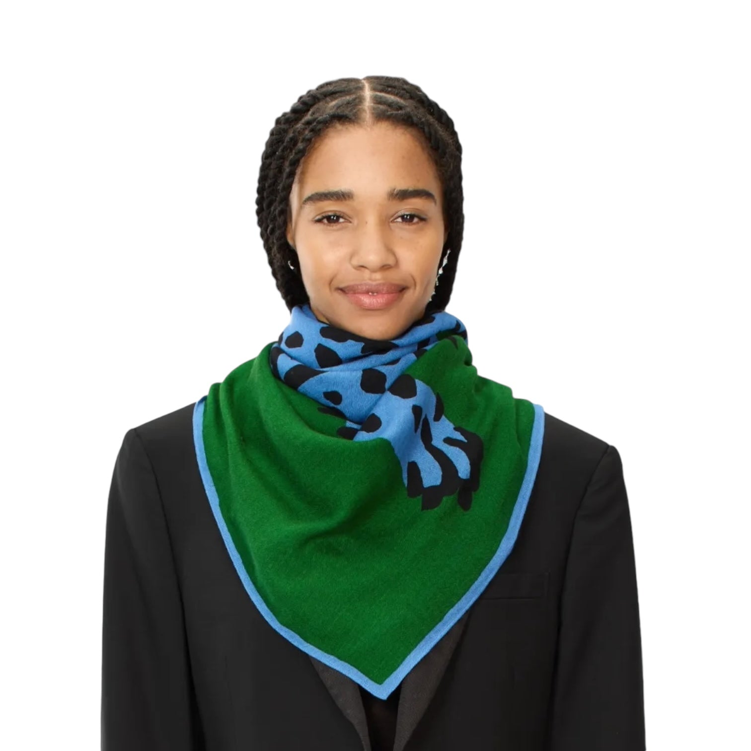 Model wearing a green square scarf with blue and black pattern, showcasing a stylish accessory for any outfit.