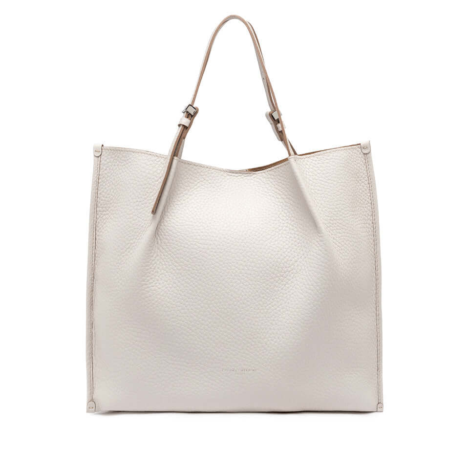 Dory lightweight leather handbag in soft white, featuring simple design and adjustable twin logoed straps.